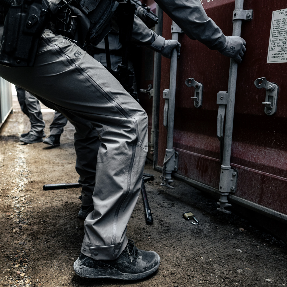Person wearing Reebok Nano X1 Adventure 6 tactical side zip boot in black
